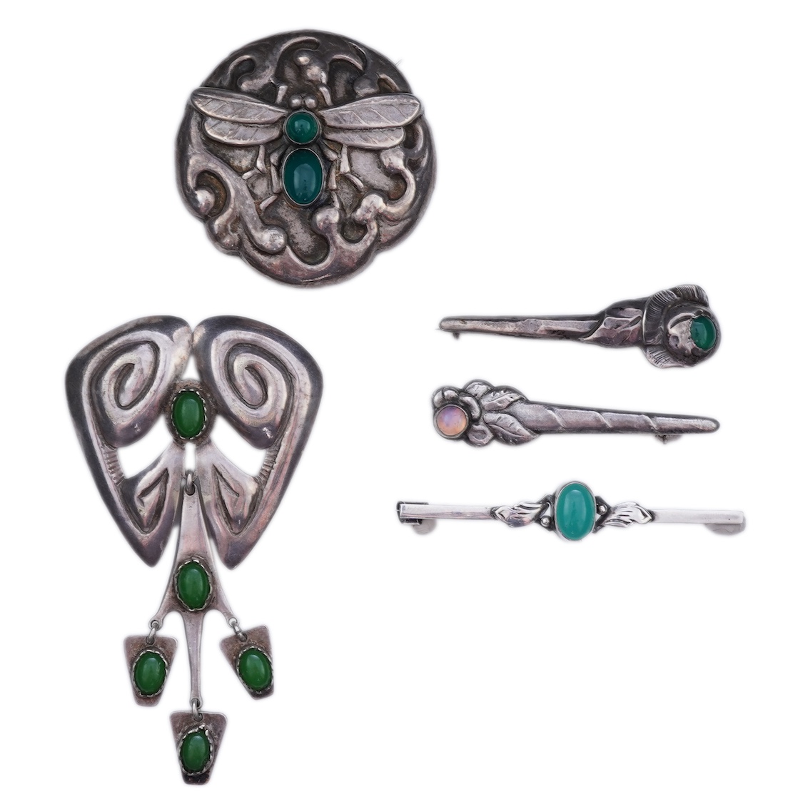 A collection of five Arts & Crafts silver brooches, Denmark, early-mid 20th century